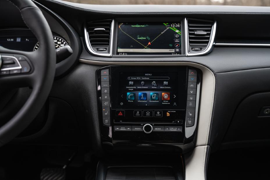The car setting shown on the center dash with a above navigation screen.