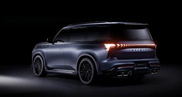 Rear angle view of the INFINITI QX80 Track Spec, light points to the vehicle from the left side.