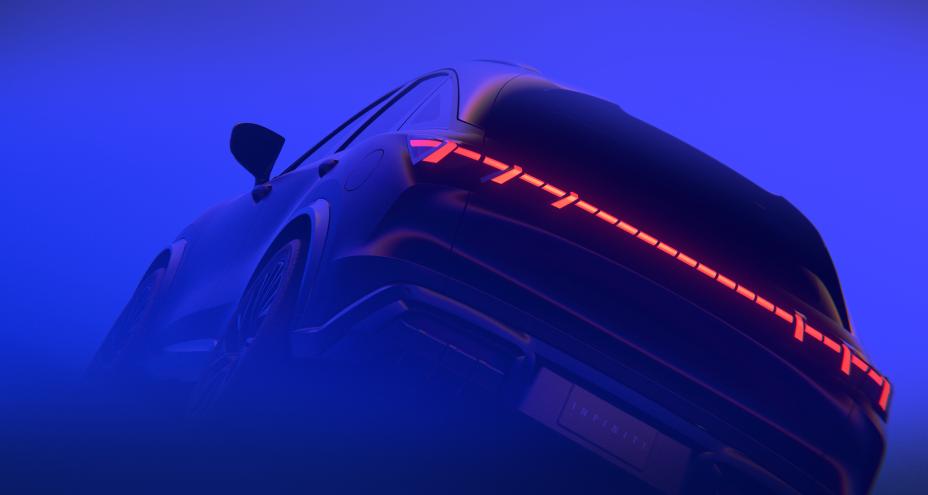 Tight angled lower view of the QX65 Monograph, a haze of electric blue light covers the area.