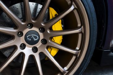 Close up of the wheel and brake caliper on the INFINTI QX80 R-Spec build.
