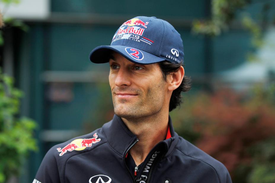 A headshot of Mark Webber in a Redbull Racing hat