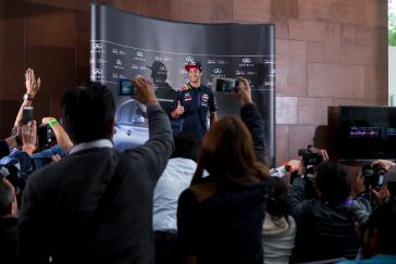 The press looking to interview Formula One Infiniti driver.