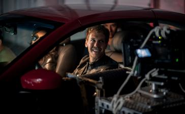 Vettel and Fiona in the INFINITI G37.