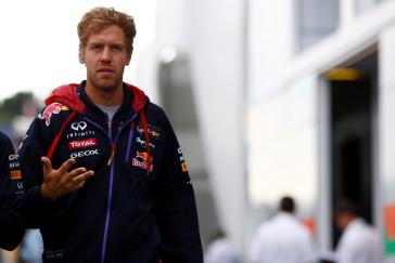 Image of INFINITI driver walking with hand out