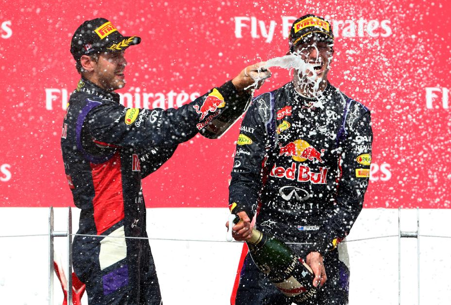 Red Bull team celebrating their victory with Champaign.