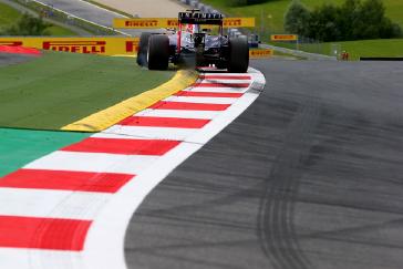 Rear image of INFINITI racer pulled over alongside of the track at the Austrian Grand Prix Practice