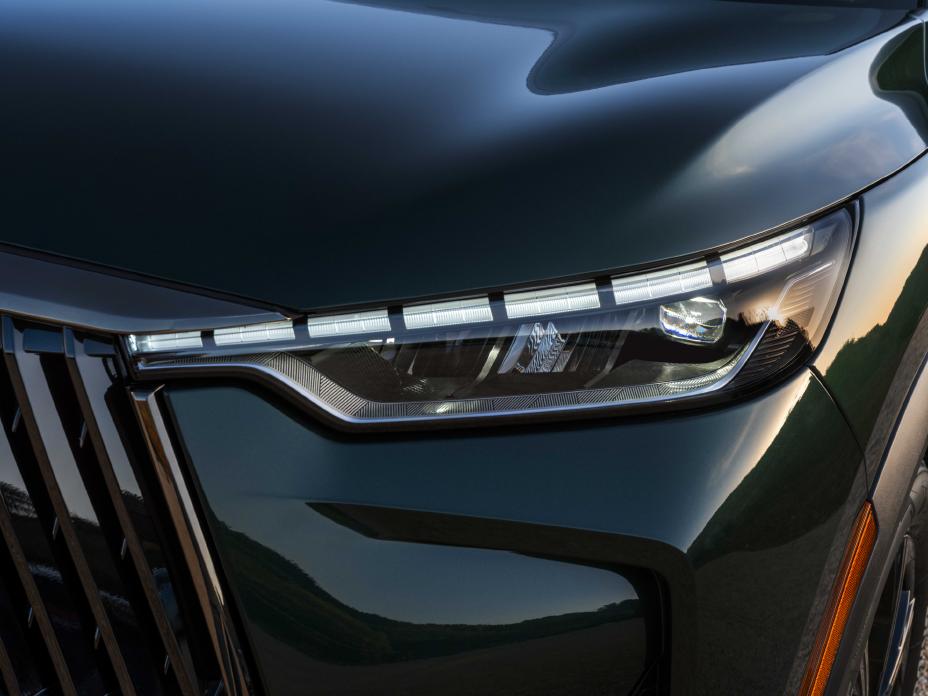 Close up of the headlight on the 2026 INFINITI QX60 during sunset.