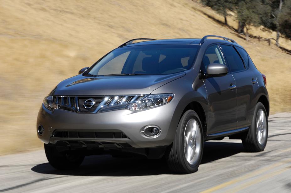 A 2010 Nissan Murano driving on a country road