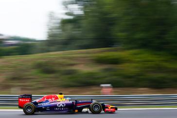 Side view of purple Infiniti F1 car.