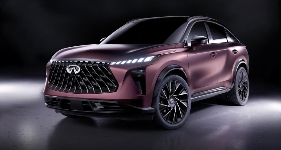 Front left 3/4 angle of the QX65 Monograph in a dark space with showroom lighting.