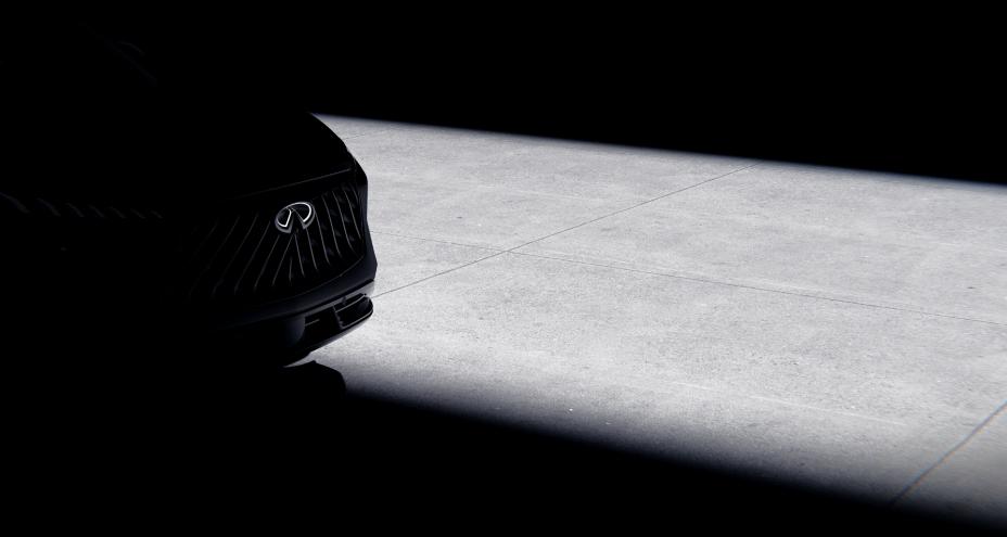 The QX65 Monograph's grill barely viewable, the center INFINITI emblem is shown.