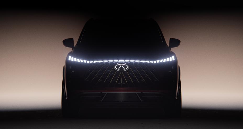 Front view of the QX65 Monograph, the headlights are illuminated and span the full width of the vehicle.