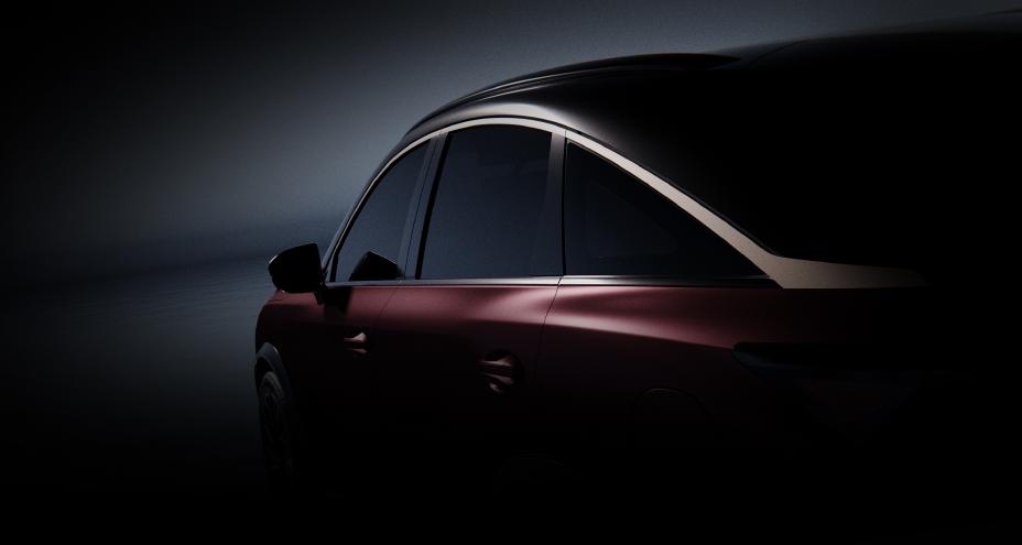 Angled view of the side of the QX65 Monograph, the lower half in cast in shadow.