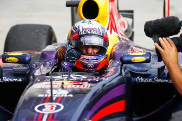 Renault Infiniti driver sitting in his car seat.