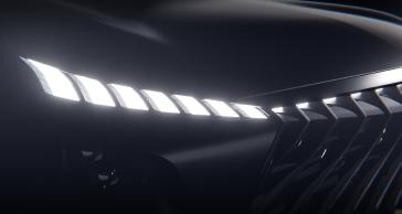 Close up of the illuminated headlight on the QX65 Monograph.