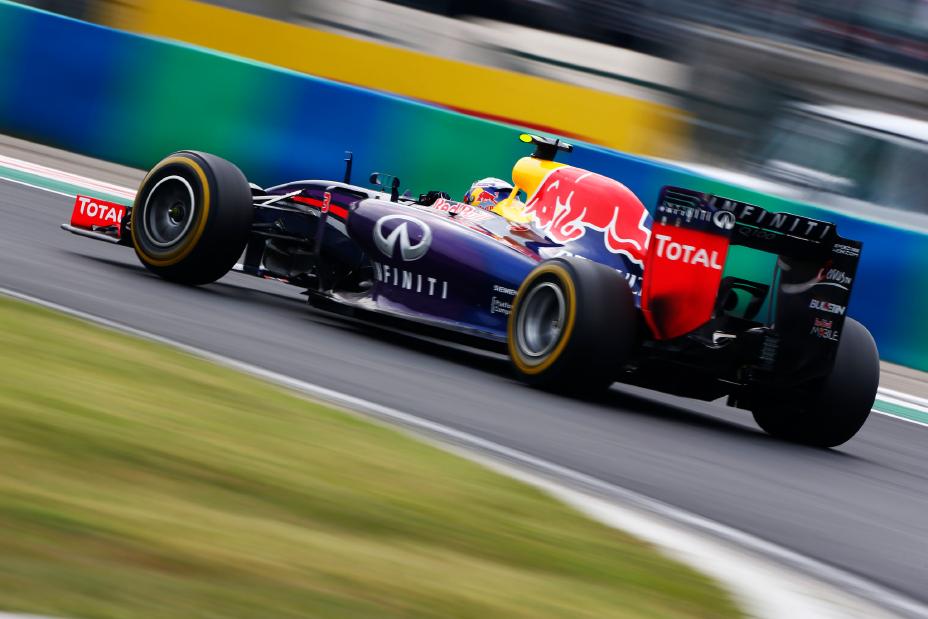 F1 race car driving on the track.