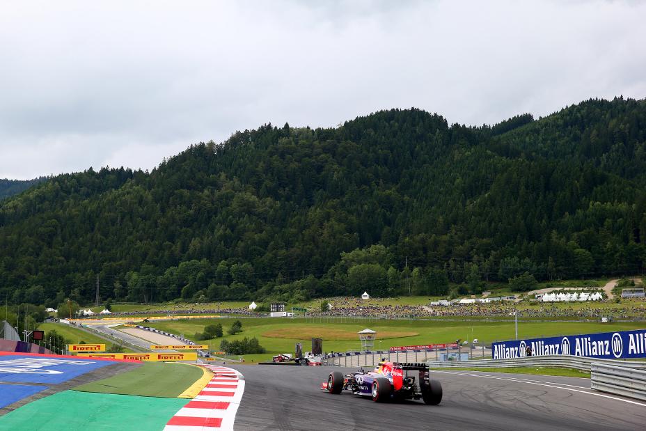 Rear image of racers driving down the track at the Austrian Grand Prix Practice