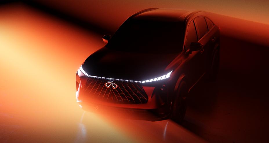 Aerial angled view of the QX65 Monograph, a haze of amber light appears from the left side.