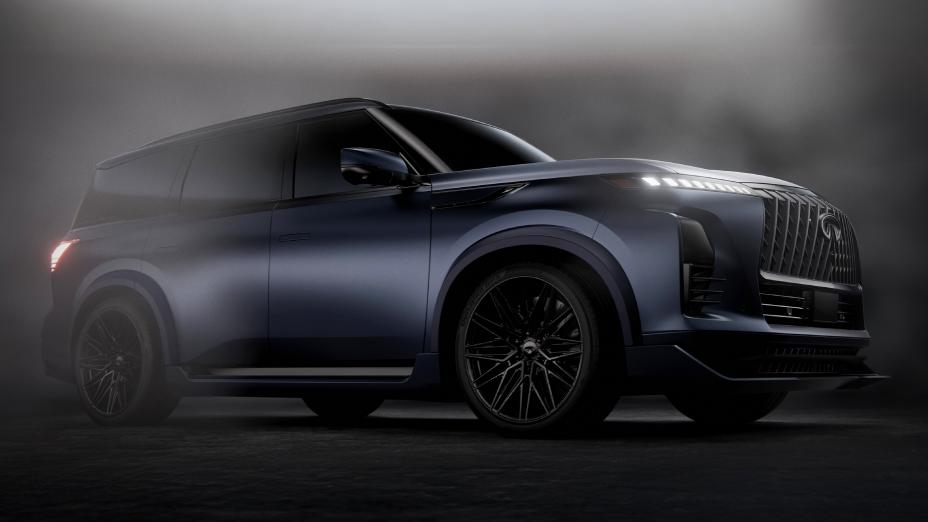 Lower angled view of the INFINITI QX80 Track Spec with a smoky haze floating around the vehicle.