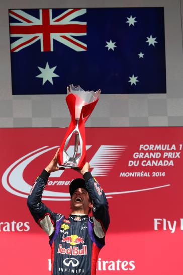 Infiniti Red Bull driver hosting the trophy.