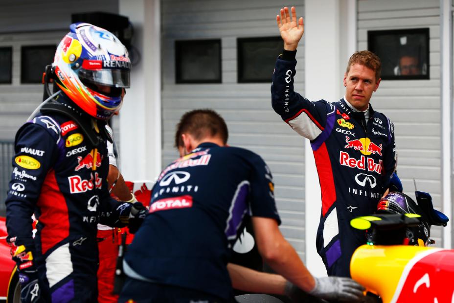 Infiniti F1 team working on the car in front of the team garage.
