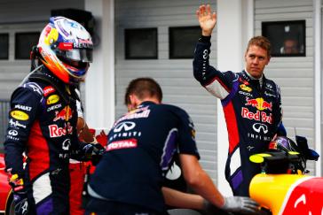 Infiniti F1 team working on the car in front of the team garage.