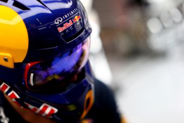 Close up image of INFINITI racer's blue and yellow helmet