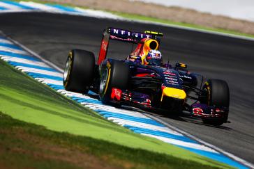 F1 tires are driving along the blue and white line