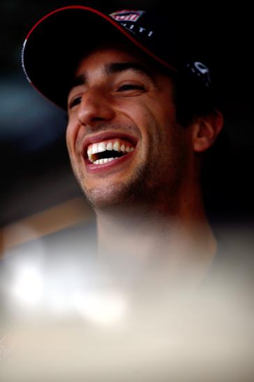 Headshot of INFINITI driver laughing