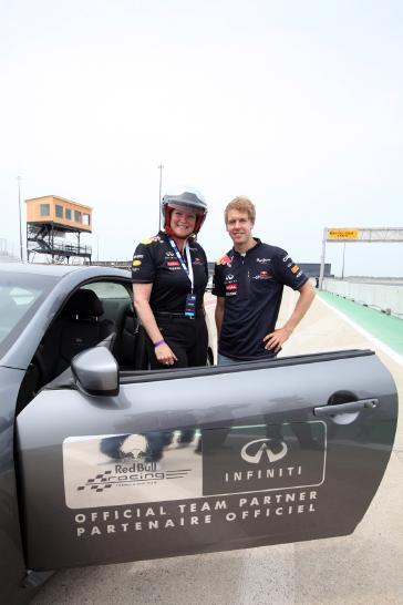 FORMULA ONE WORLD CHAMPION SEBASTIAN VETTEL PUTS WENDY DURWARD AND INFINITI IPL TO THE TEST ON THE TRACK