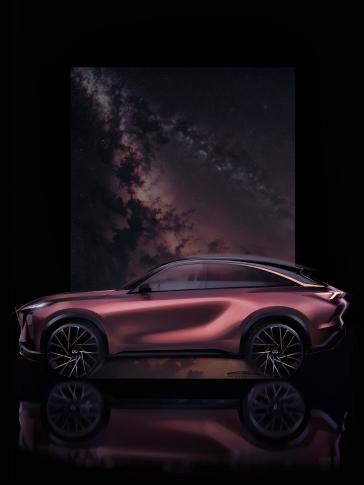 Profile view of the QX65 Monograph in a dark room, galaxy artwork is displayed behind the vehicle.
