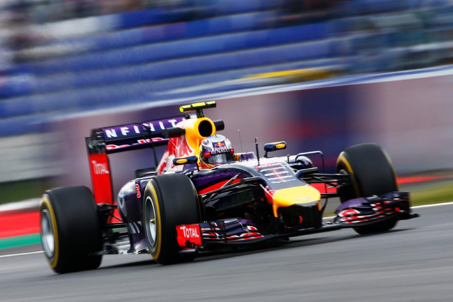 Front right view of INFINITI racer coming down the track