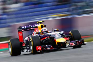 Front right view of INFINITI racer coming down the track