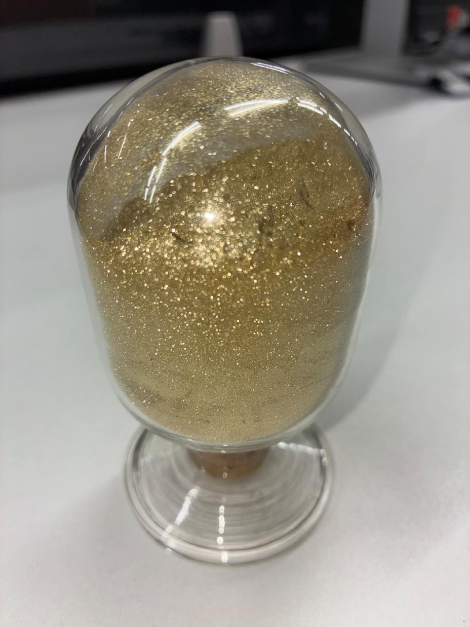 Sunfire Red gold pigment sample sitting on a countertop.