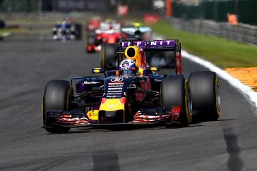 Front view of a racecar driver winning in a race