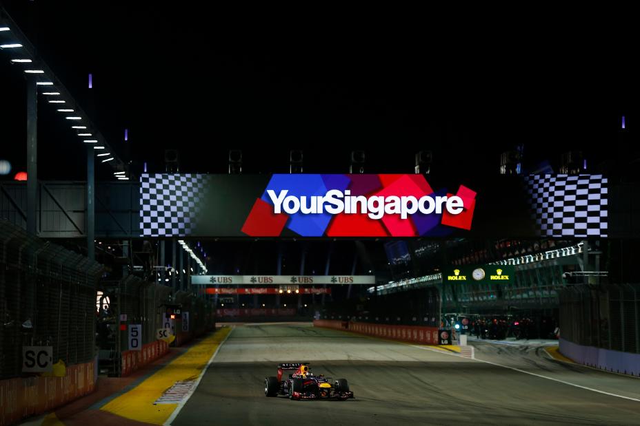 Infiniti F1 car with a Singapore screen behind it.
