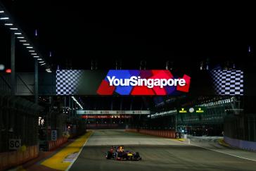 Infiniti F1 car with a Singapore screen behind it.