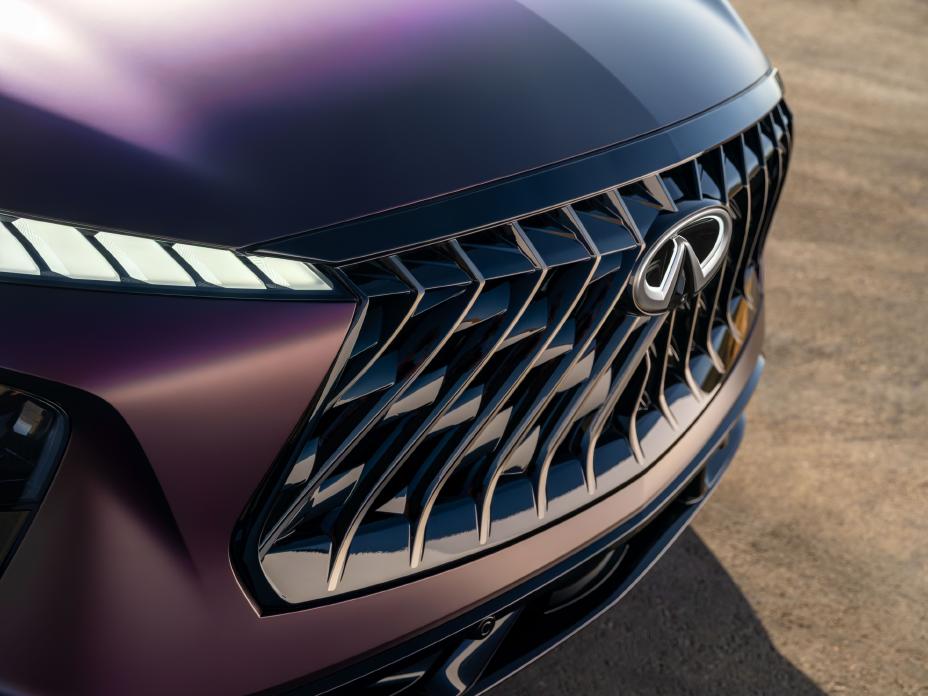 Upper angled view of the hood and grill on the QX65 Monograph.