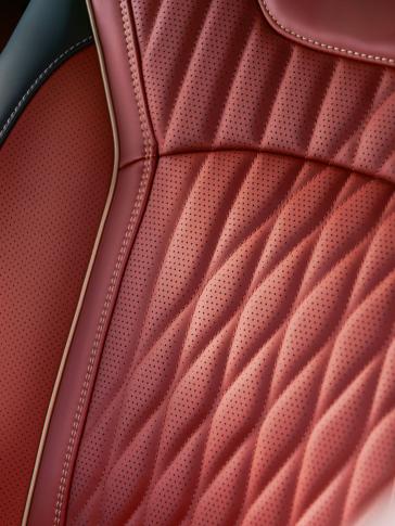 Close up of the quilting texture on the interior seats inside the 2027 INFINITI QX65.