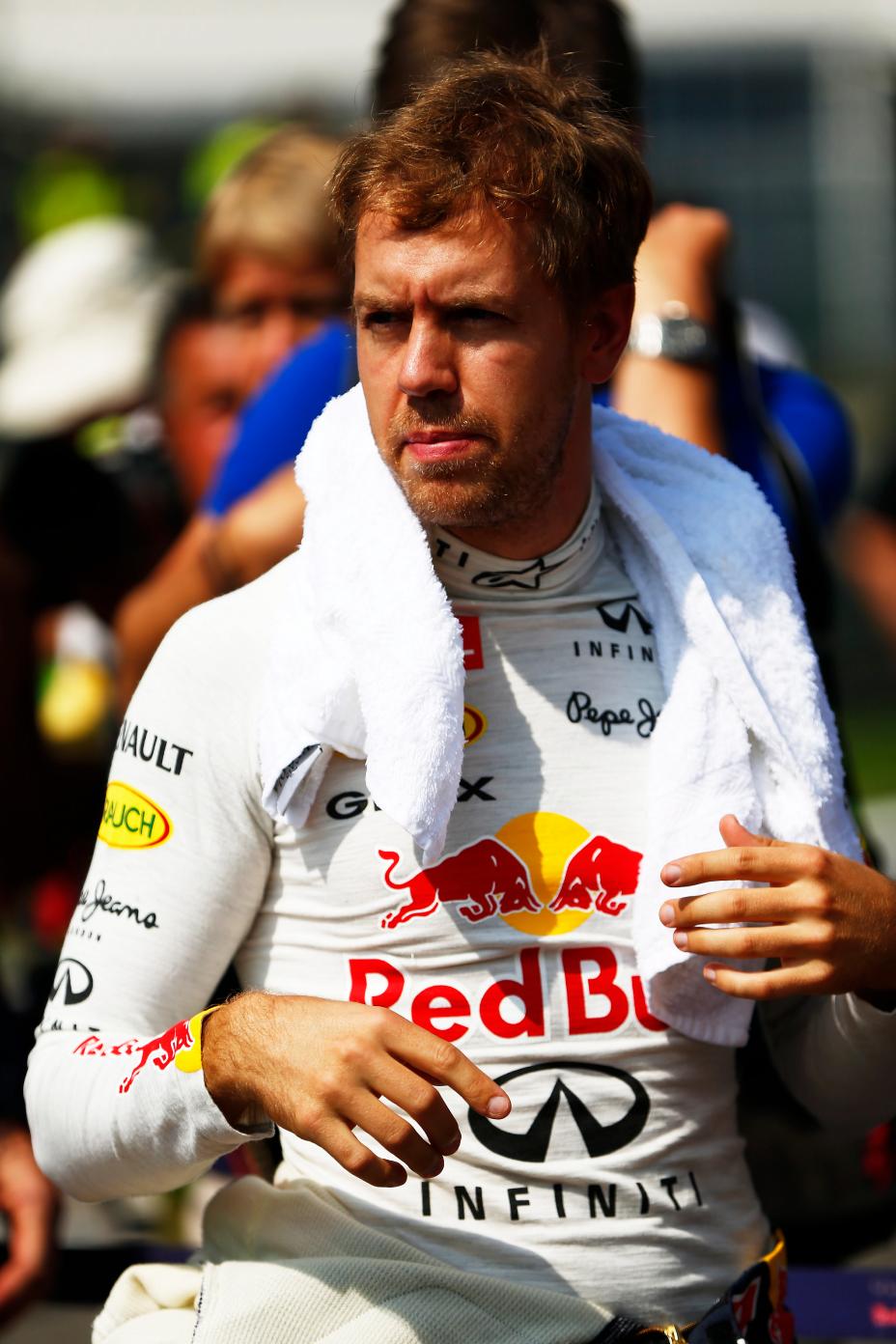 Formula One race driving prepping for race in Italy.