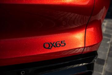 Close up of the "QX65" decal on the trunk of the 2027 INFINITI QX65.